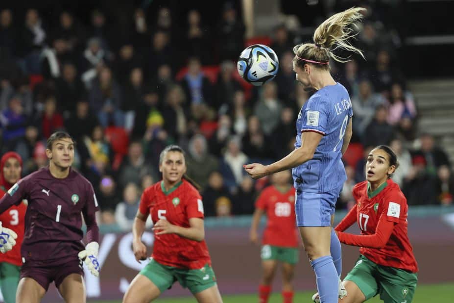 France's Eugénie Le Sommer heads the ball for her team's fourth goal — and her second of the match — against Morocco. 